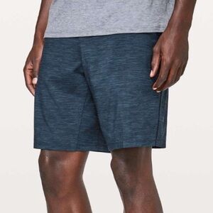 Lululemon Pace Breaker Short *Linerless 9"
Heather Allover Iron Navy Large